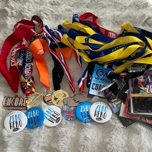 Collection of Cheerleading Medals and Ribbons
